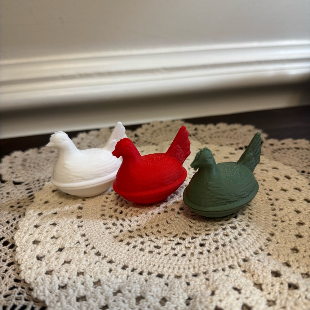 Set of Three Hen on Nest Figurines in Red, White, and Green
